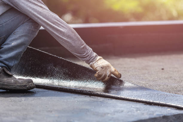 Professional Basement Waterproofing technician working in Mantoloking, NJ